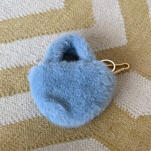 Claire's Soft Blue Fluffy Bag Charm